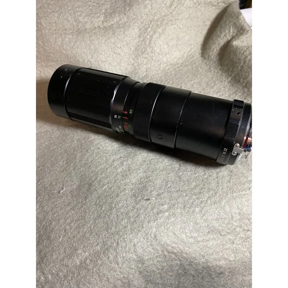 SOLIGOR AUTO-ZOOM LENS I:4.5 F=9OMM -230MM 58‎